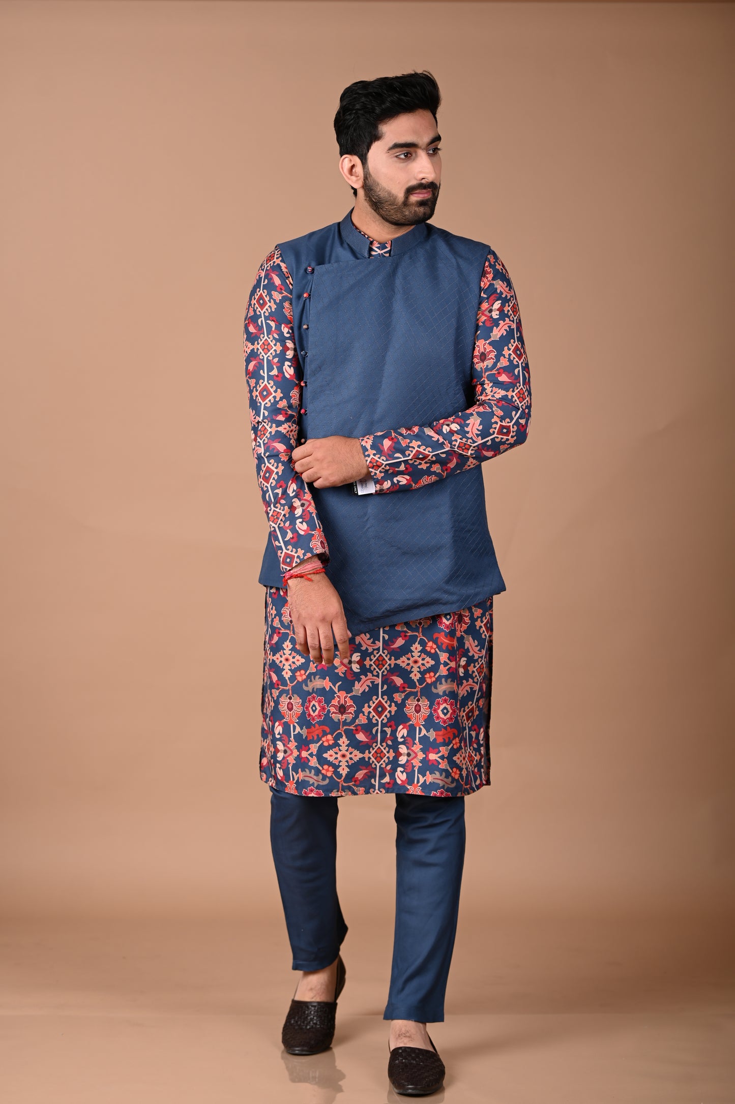 Sapphir Blue Ikkat Print Kurta With Asymmetrical Bundi Pajama Set