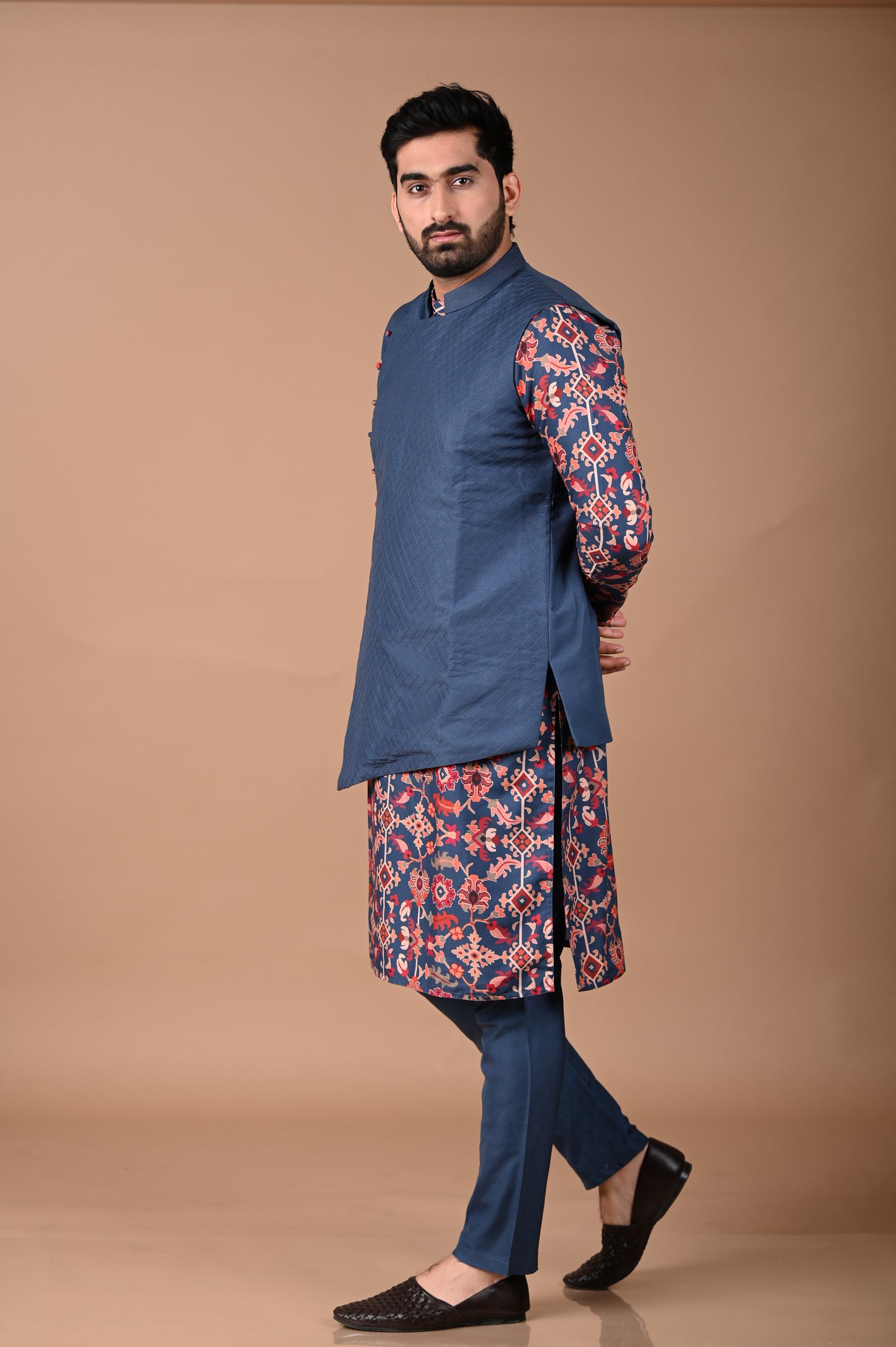 Sapphir Blue Ikkat Print Kurta With Asymmetrical Bundi Pajama Set