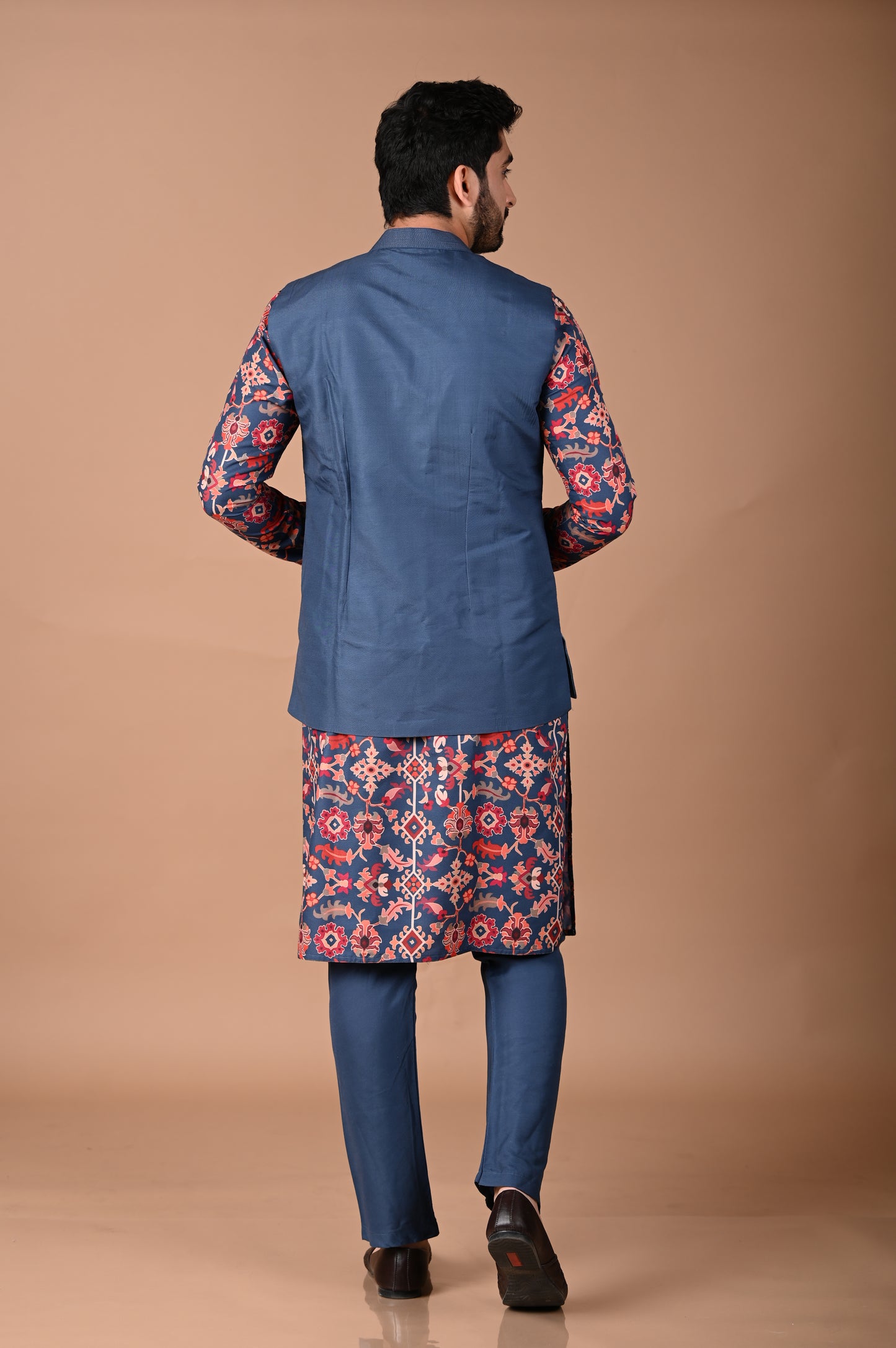 Sapphir Blue Ikkat Print Kurta With Asymmetrical Bundi Pajama Set