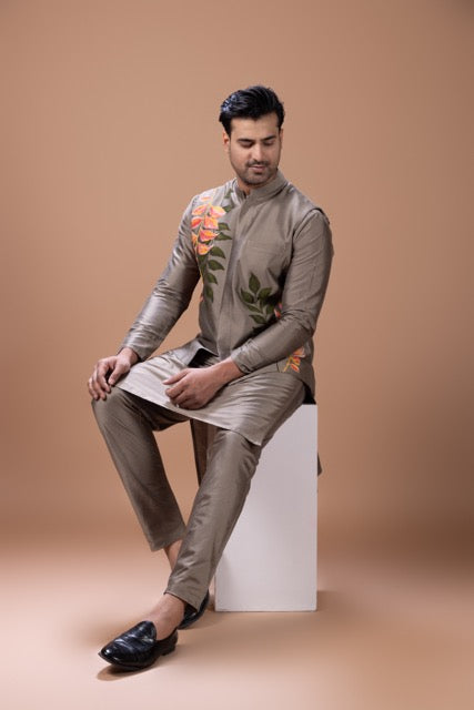 Metalic Fawn Pleated Stylish Kurta With Colourful Leafs Hand Foam Painted Bundi Jacket With Pajama Set