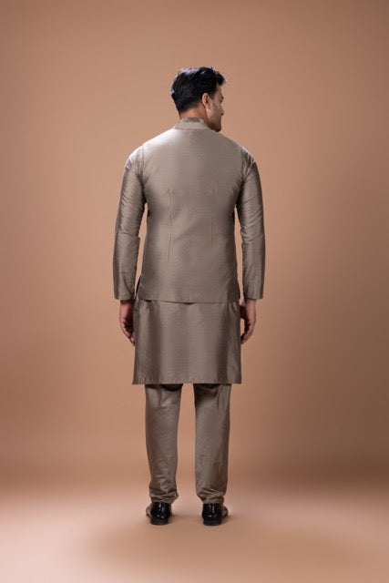 Metalic Fawn Pleated Stylish Kurta With Colourful Leafs Hand Foam Painted Bundi Jacket With Pajama Set