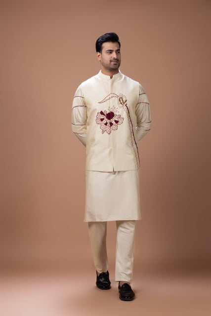 Beidge Pleated In Hand Stylish Kurta With Hand Flowerand Brnach Embroidery On Bundi Jacket With Pajama Set