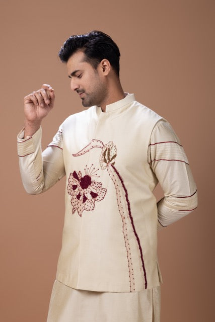 Beidge Pleated In Hand Stylish Kurta With Hand Flowerand Brnach Embroidery On Bundi Jacket With Pajama Set
