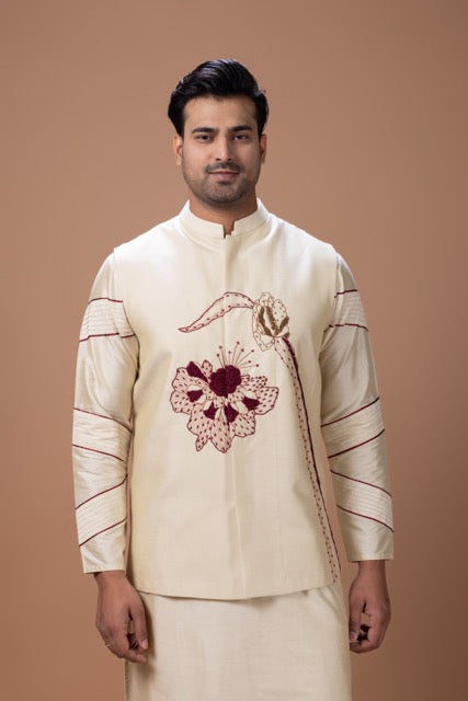 Beidge Pleated In Hand Stylish Kurta With Hand Flowerand Brnach Embroidery On Bundi Jacket With Pajama Set