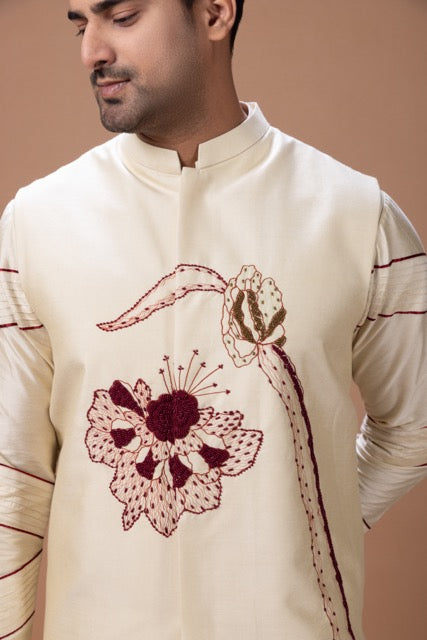 Beidge Pleated In Hand Stylish Kurta With Hand Flowerand Brnach Embroidery On Bundi Jacket With Pajama Set