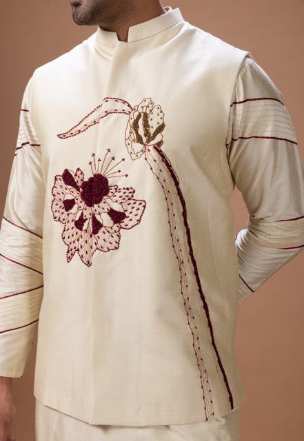 Beidge Pleated In Hand Stylish Kurta With Hand Flowerand Brnach Embroidery On Bundi Jacket With Pajama Set