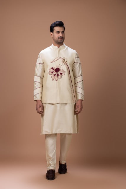 Beidge Pleated In Hand Stylish Kurta With Hand Flowerand Brnach Embroidery On Bundi Jacket With Pajama Set