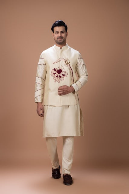 Beidge Pleated In Hand Stylish Kurta With Hand Flowerand Brnach Embroidery On Bundi Jacket With Pajama Set