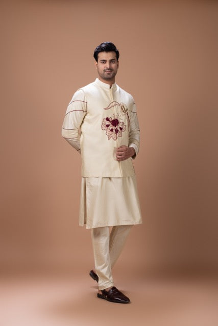 Beidge Pleated In Hand Stylish Kurta With Hand Flowerand Brnach Embroidery On Bundi Jacket With Pajama Set