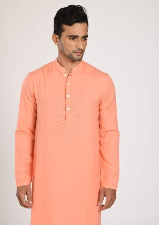 Peach Kurta With Asymmtrical Printed Jacket With Churidar