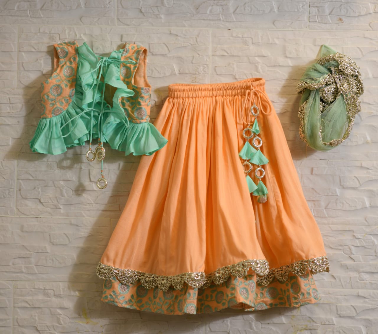 Peach And Aqua Green Heavy Embroidered Blouse And Ghagara Set